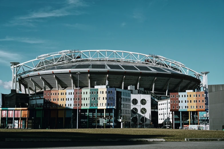 the large building in front of the stadium is empty