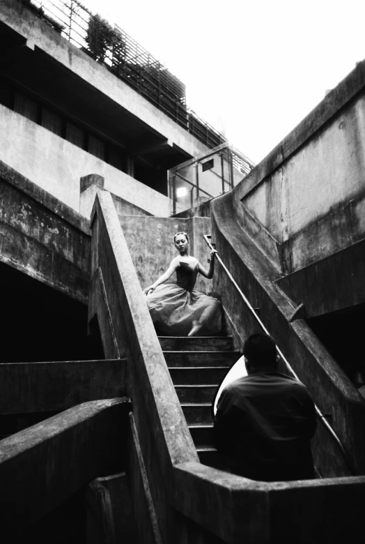 a man who is climbing up the stairs