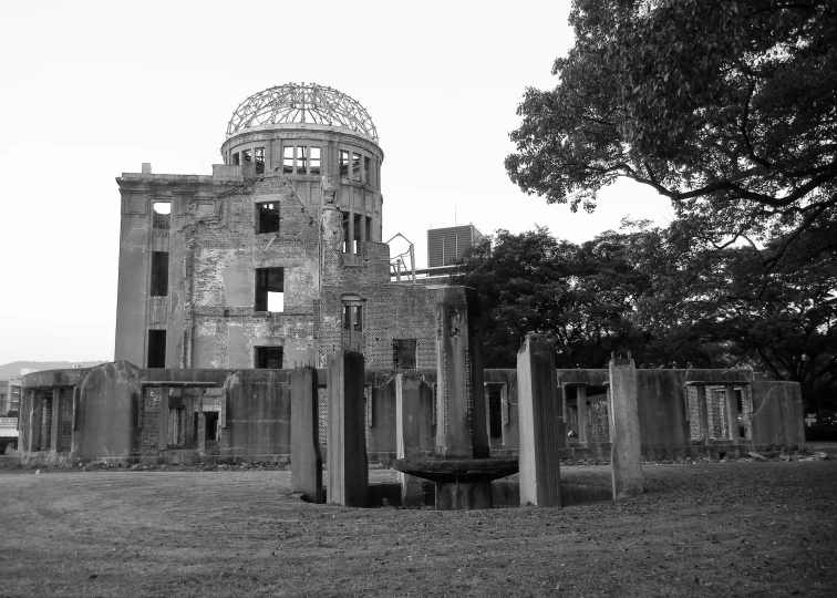 a old building in the middle of a cemetery