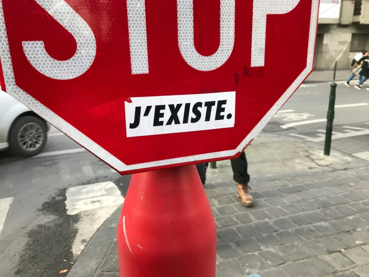 there is a stop sign with a sticker that says jexsie on it