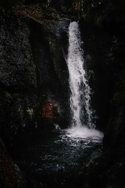 a small waterfall cascading over the rocks