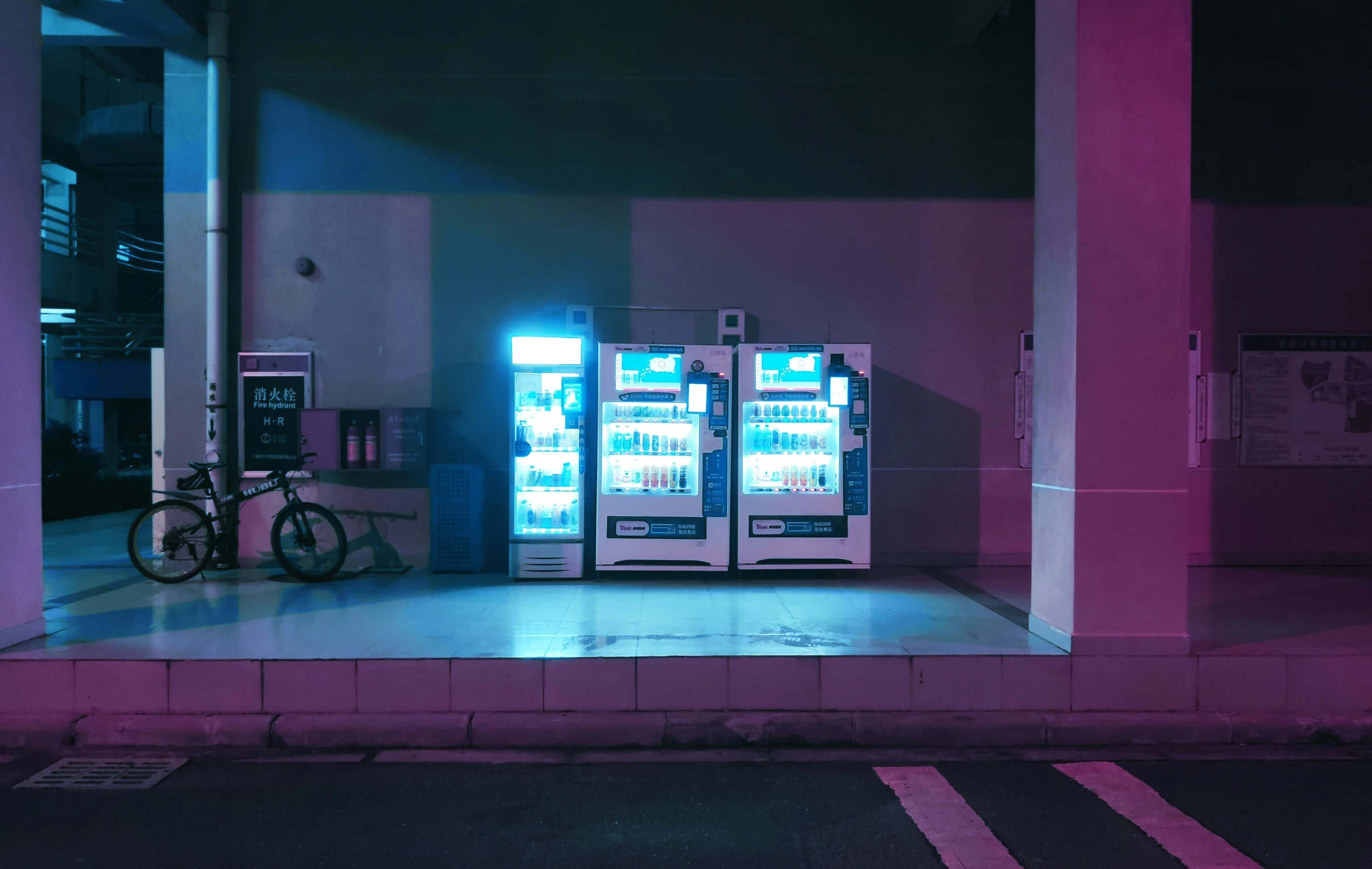 two vending machines on the side of a building