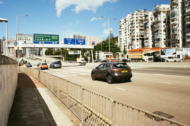 a car sits parked on the side of the road