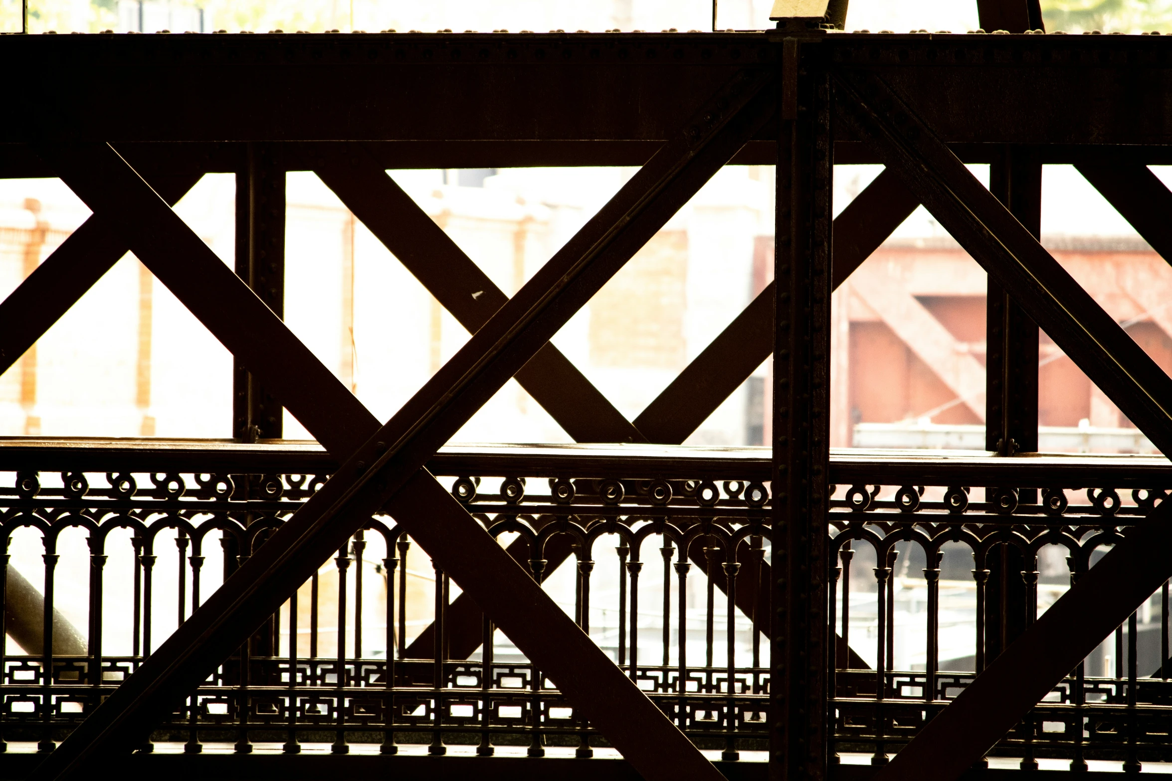 a bird perched on top of a bridge