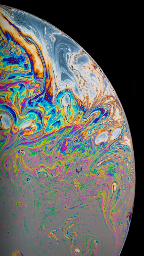 a very close up s of a planet with swirly colors