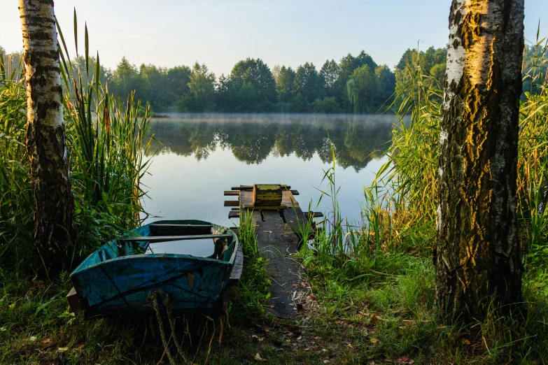 a small body of water next to some boats