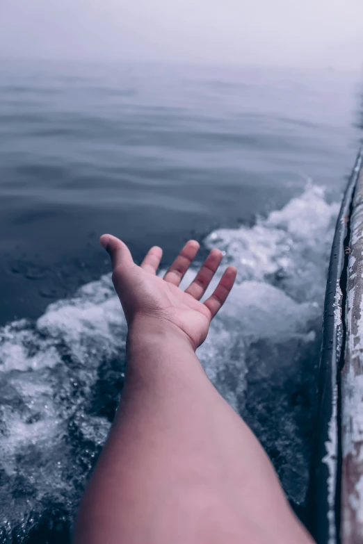 a person's foot sticking out of a boat