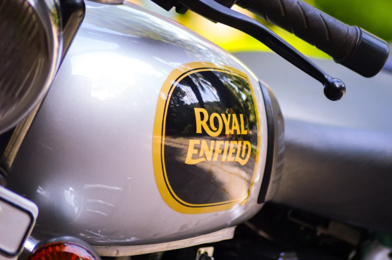 the back side of a motorcycle with the emblem of an expotrox