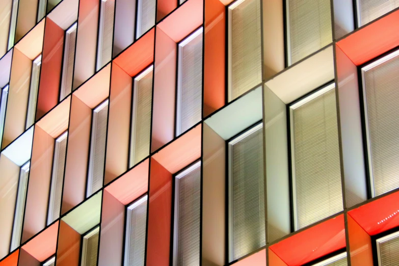 a multi colored wall of cubes is shown