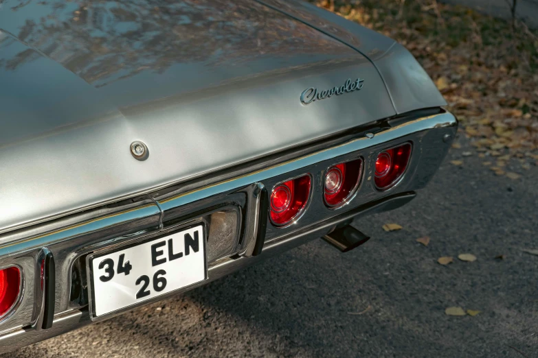 rear end view of automobile with a license plate