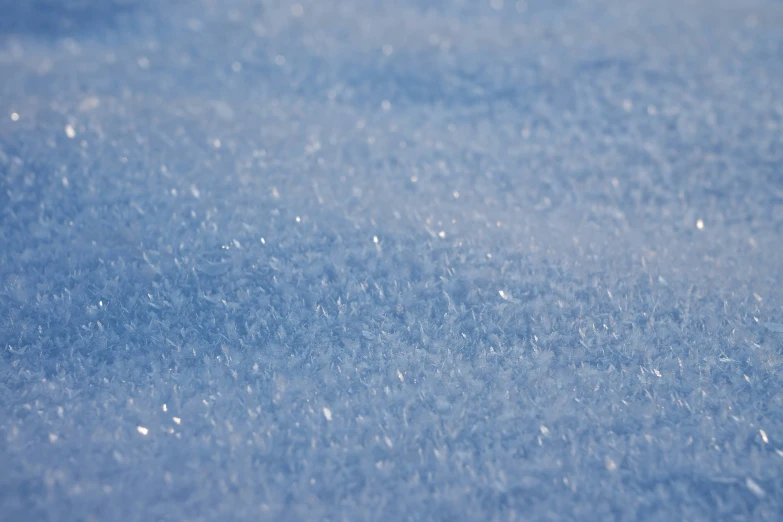 snow flakes are seen falling down into the sky