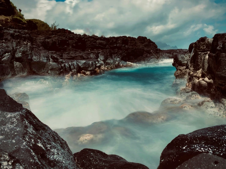 blue waters and rocks in an area that appears to be underwater