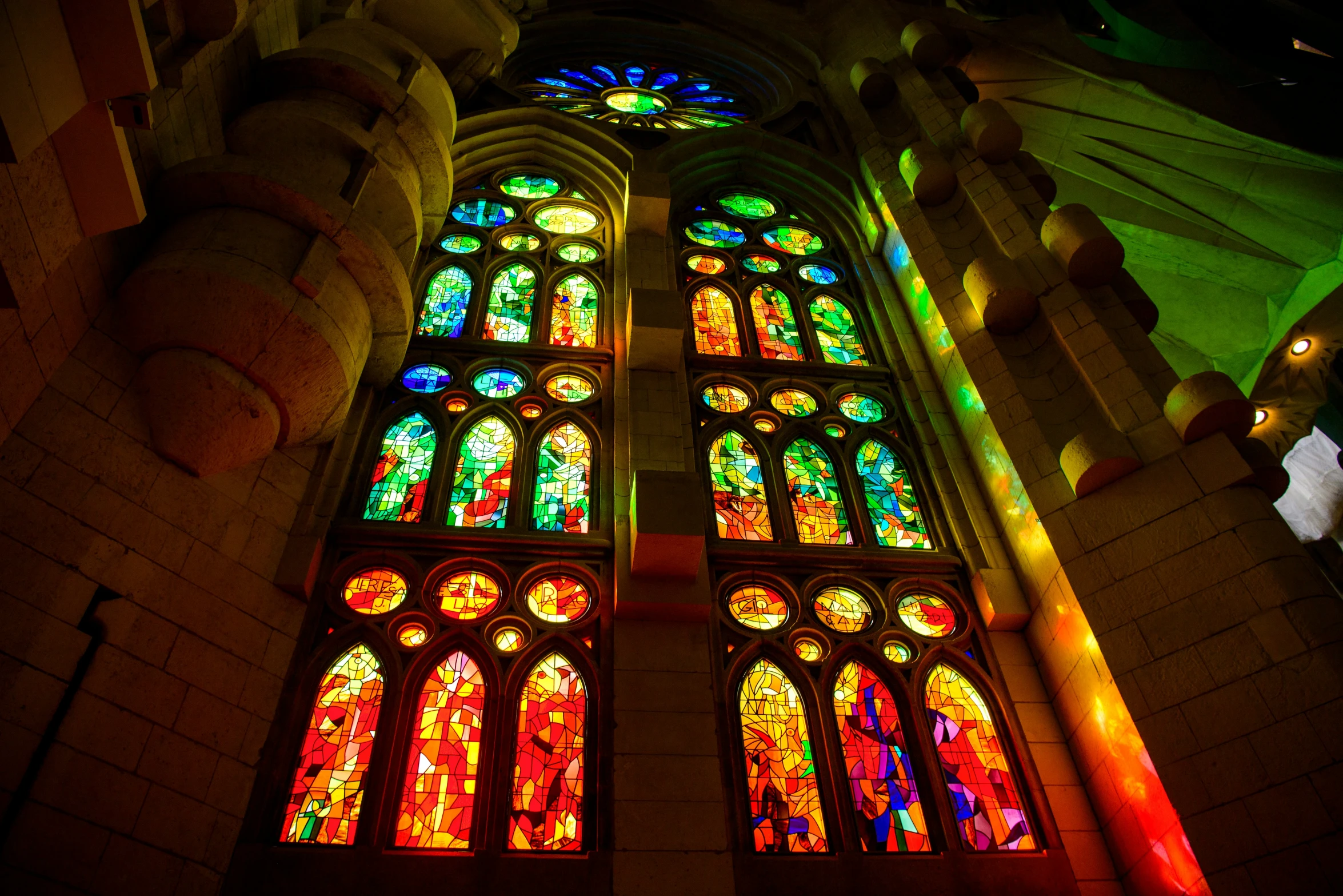 the large stained glass window of a cathedral