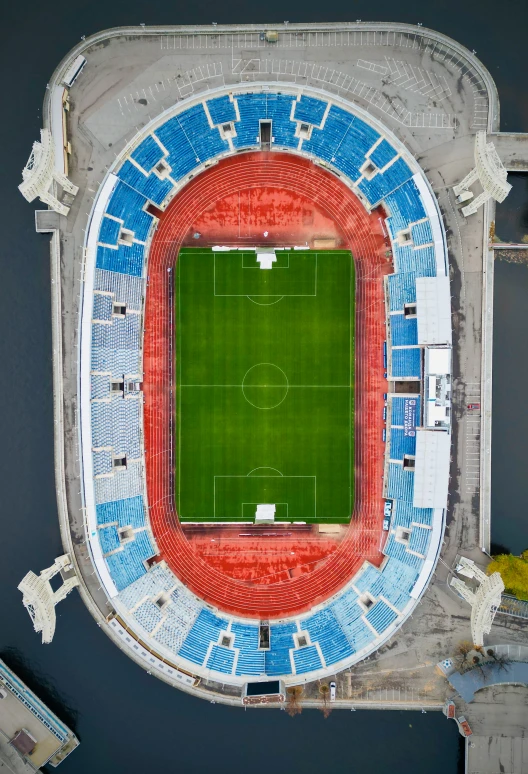 a soccer stadium with several teams and pitch