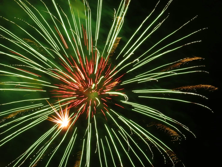 a close up of a firework at night