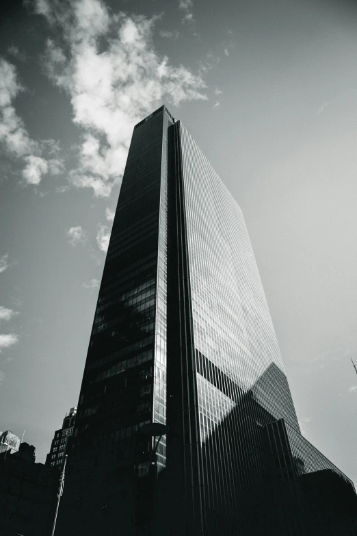 the shardle building in black and white is on a clear day