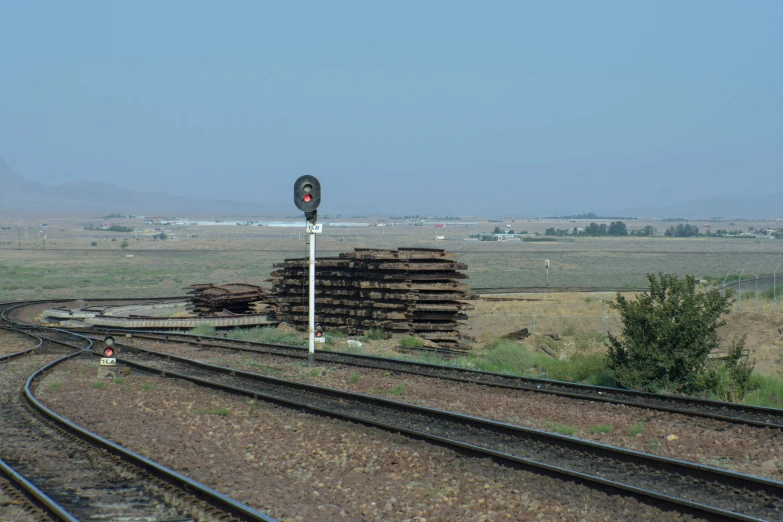 the rail road tracks are empty but only for trains