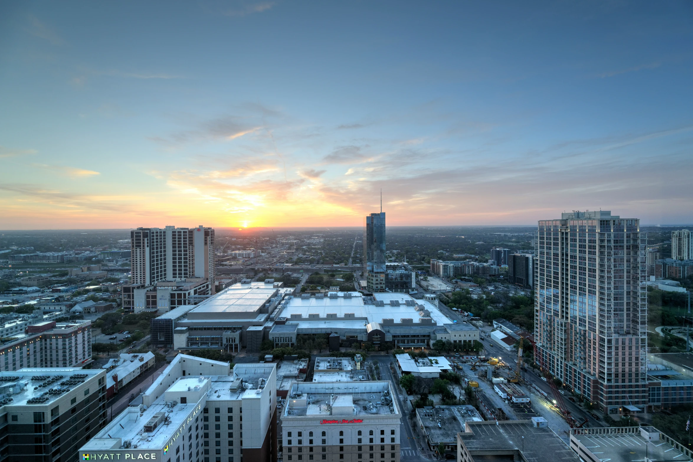 a wide view of a city at sunset