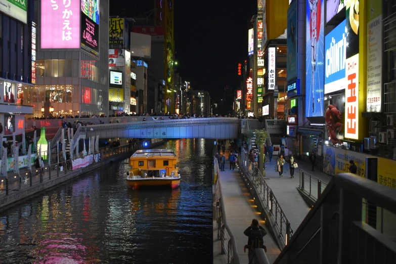 a view of a busy and colorful river in a city