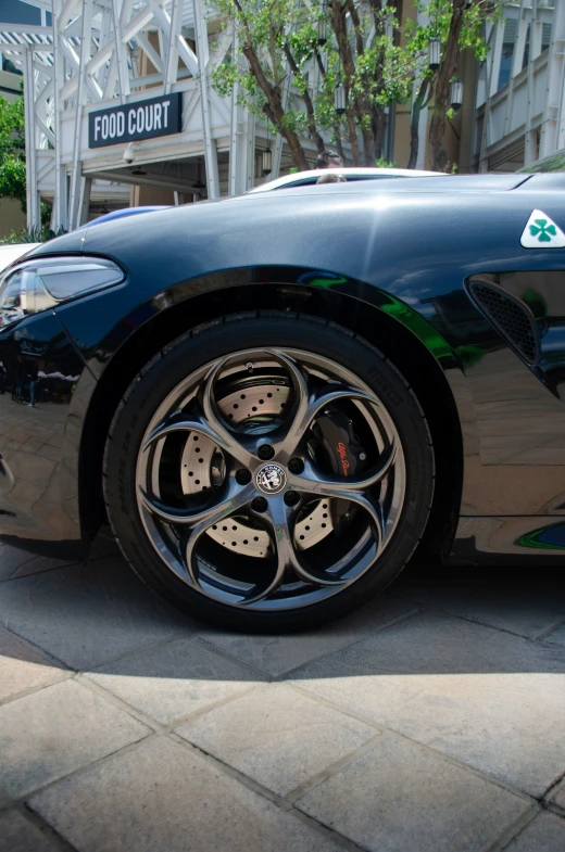 this sports car is parked on the side of the road