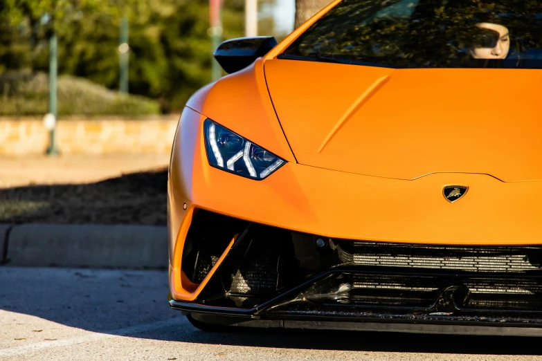 the front end of a lambino in orange