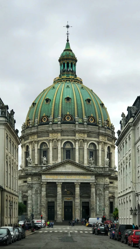 a very large building with a gold domed roof