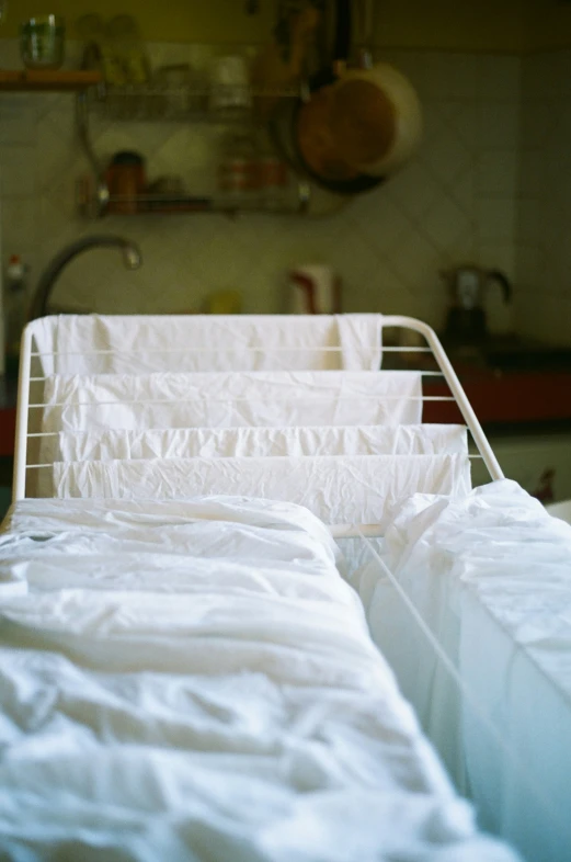 two white pillows in front of a hospital bed