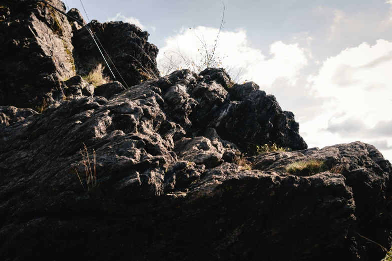 this is a po of a rock outcropping that looks like it's on the side of a mountain