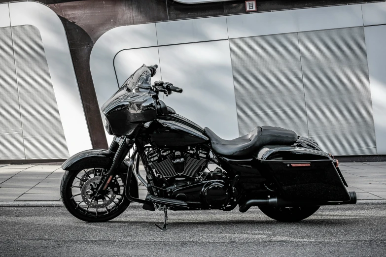 a motorcycle that is parked by a building