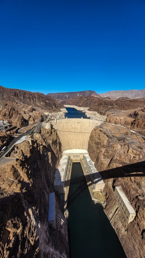 aerial view of two different levels with water and buildings in the middle