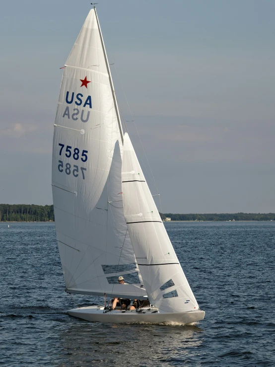 an image of two boats sailing in the ocean