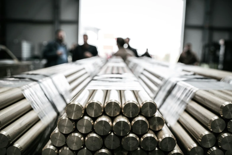 large amounts of large metal pieces are stacked and ready to be sold