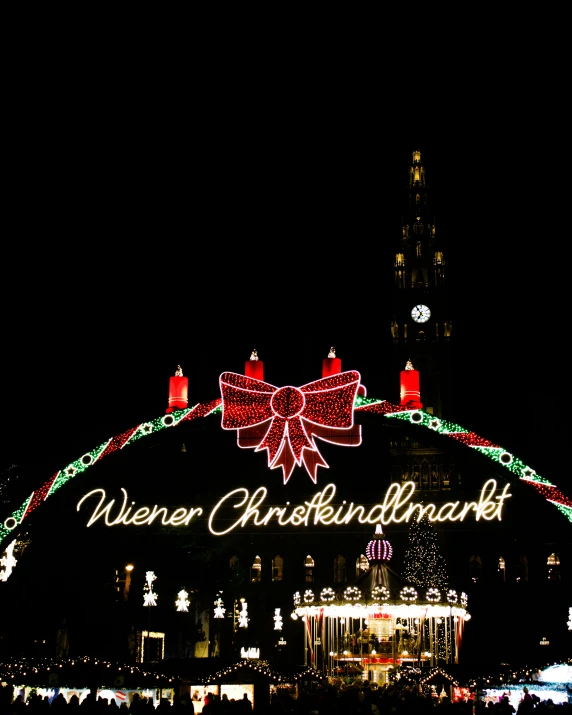 a church with lights and an advertit on it