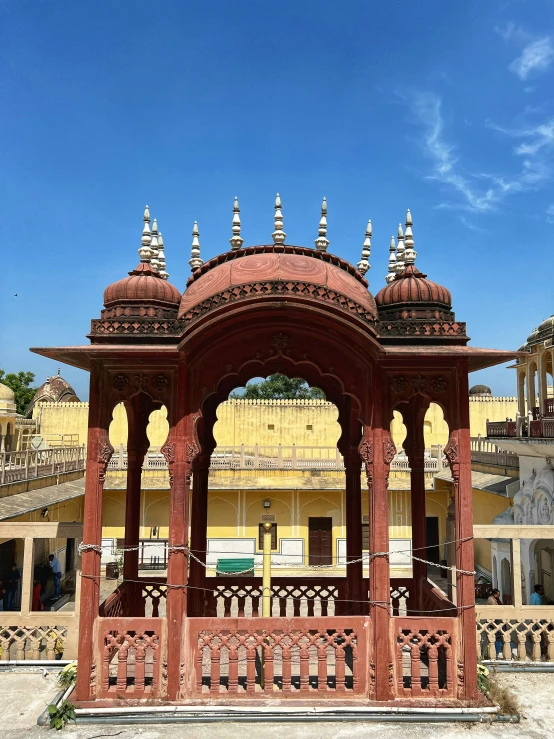 an indian structure on a street in the city