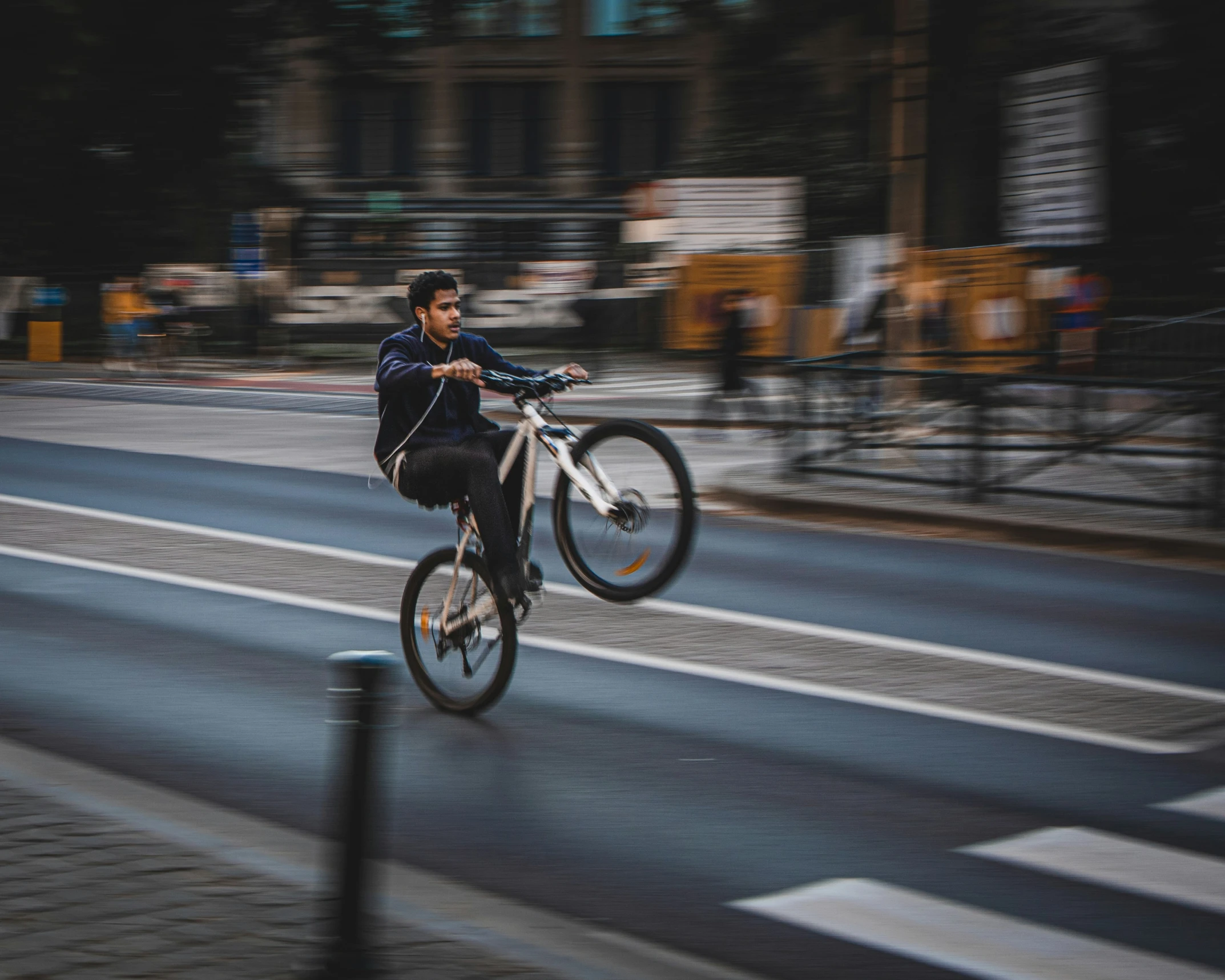 a person is riding on a bike and doing stunts