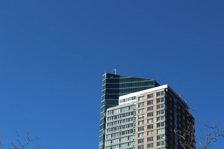 the building is tall and has windows to let light into