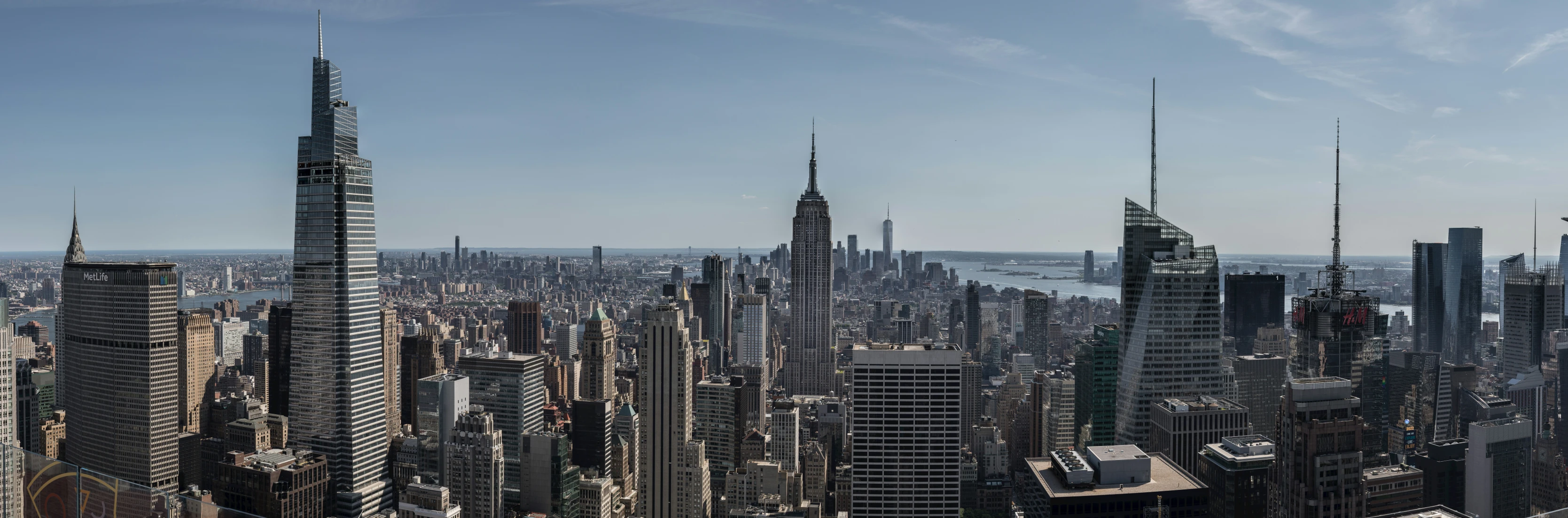 a view of a large city area with tall buildings