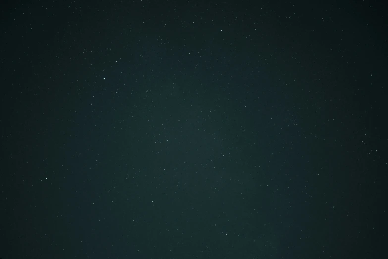 green sky with white stars at night and black skies with white dots