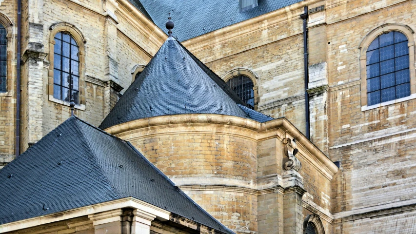 a large building with two towers and arched windows