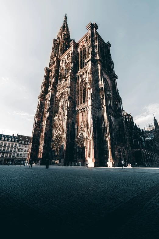 a large cathedral type structure with light reflecting off its windows