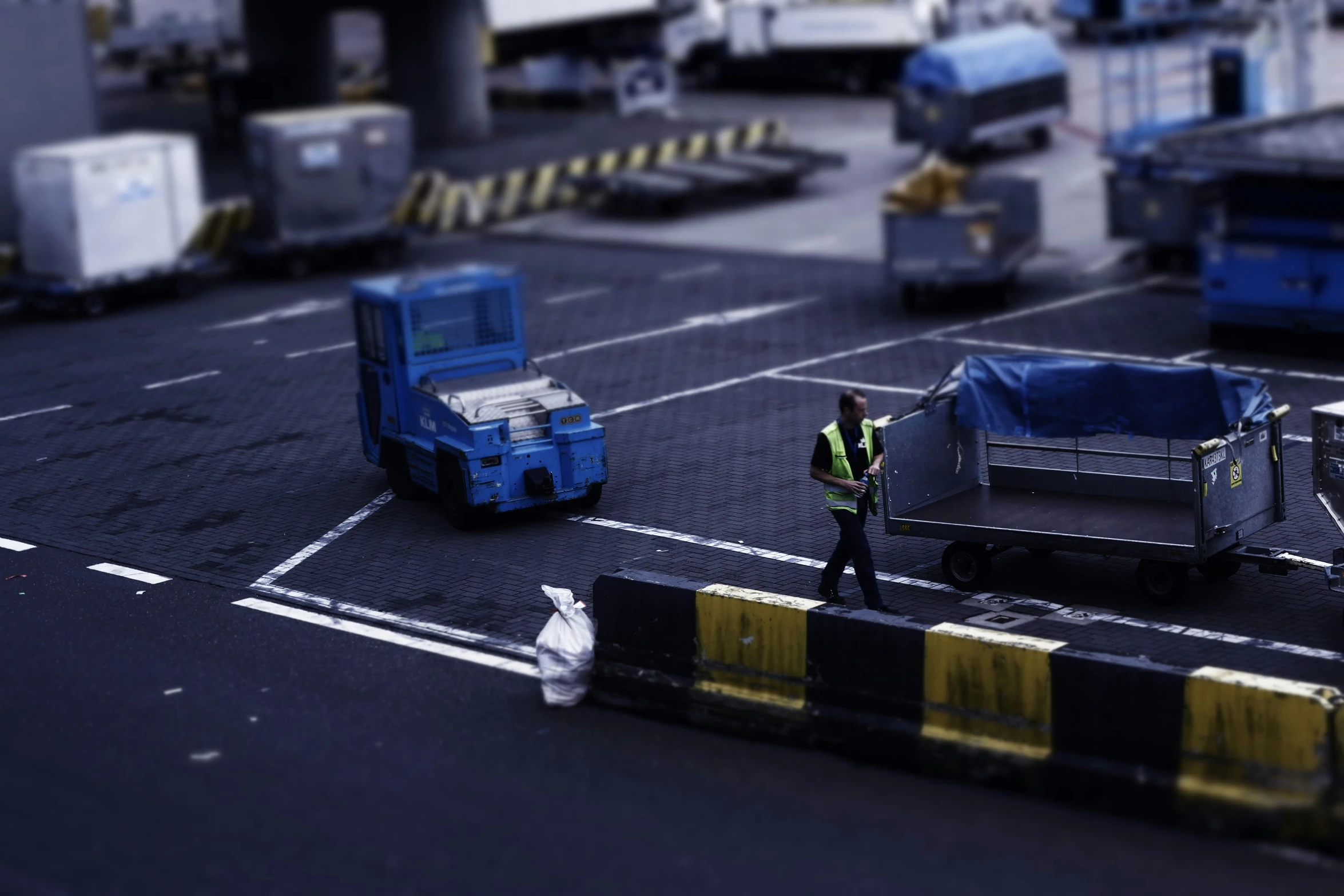 trucks parked on the tarmac at the airport