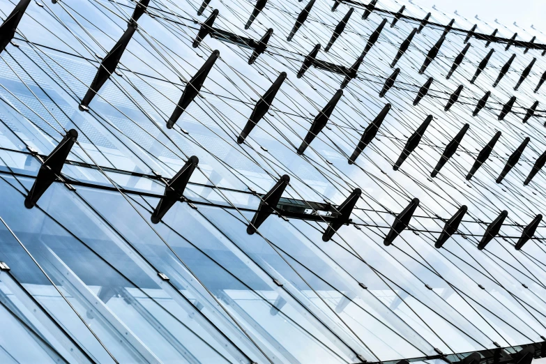 several electrical wires connected to an electric tower