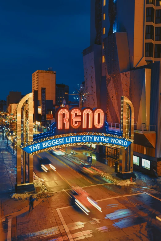 an old neon sign that reads reno is lit up for the night