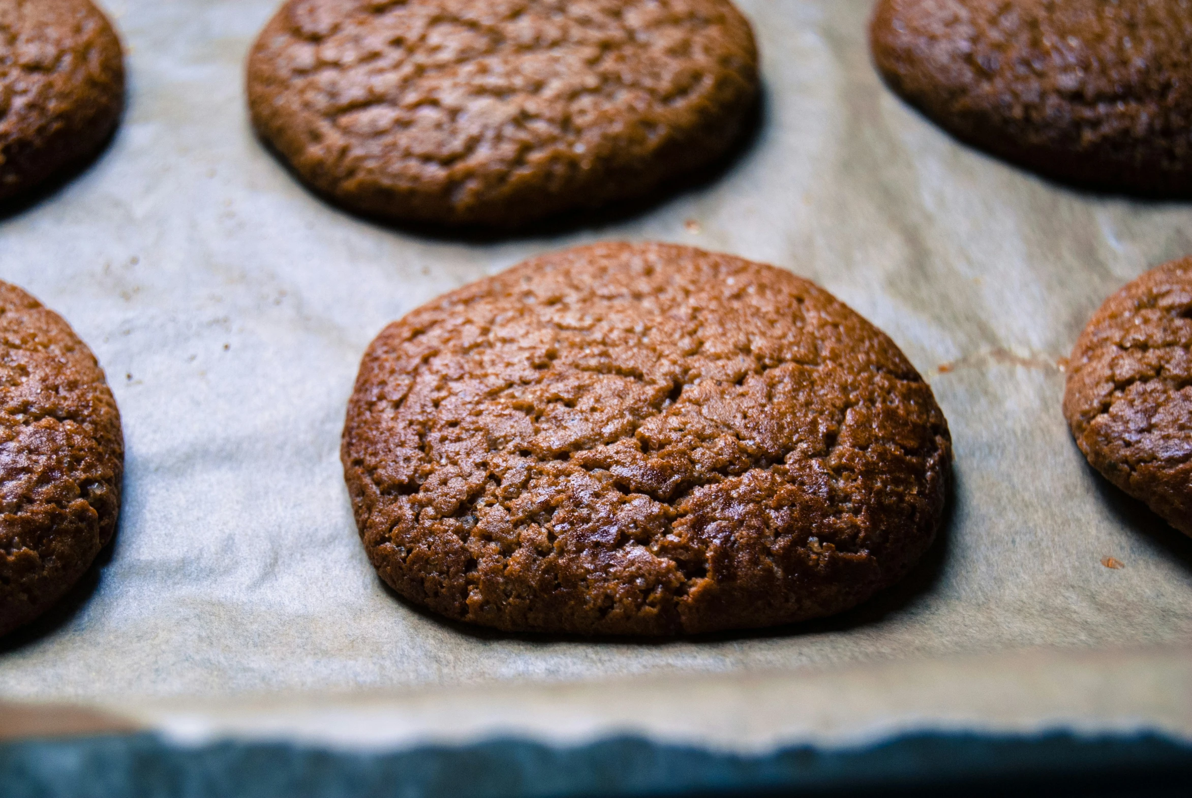 chocolate cookies are lined up in a tray