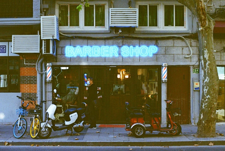 the bicycle shop has bicycles in front of it