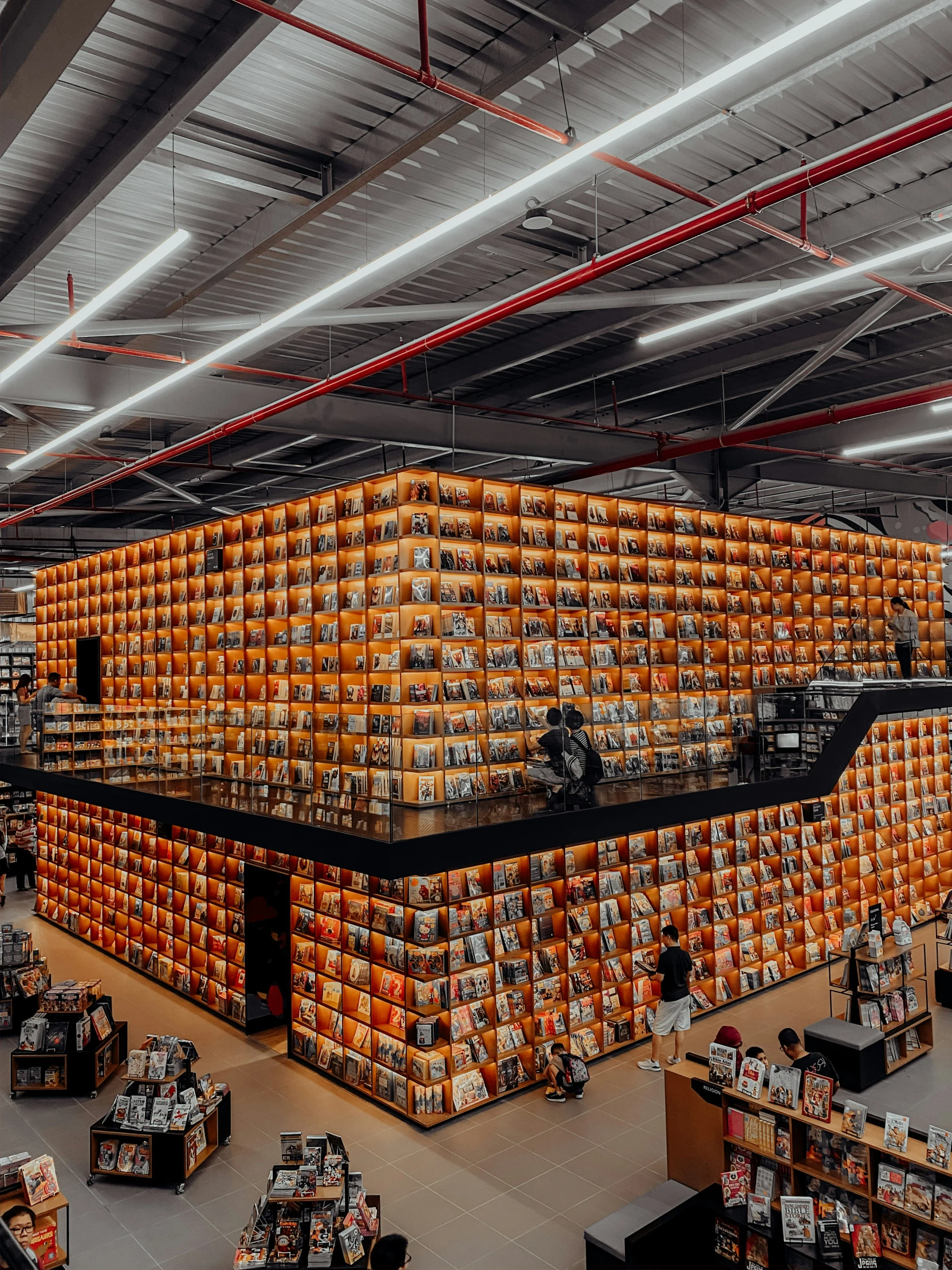 the inside of an empty store filled with orange boxes