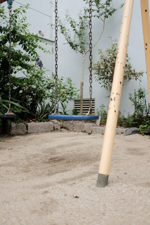 a swing and tire hanging from a rope