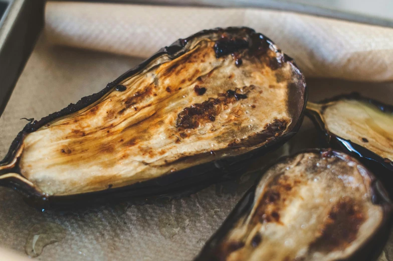 eggplant in a baking pan that is almost ready to eat