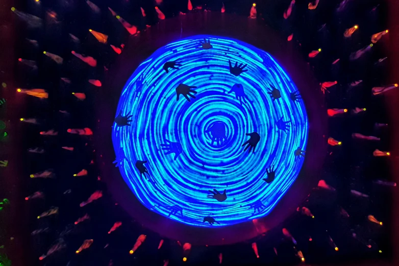 a colorful object with lights in the shape of a circular