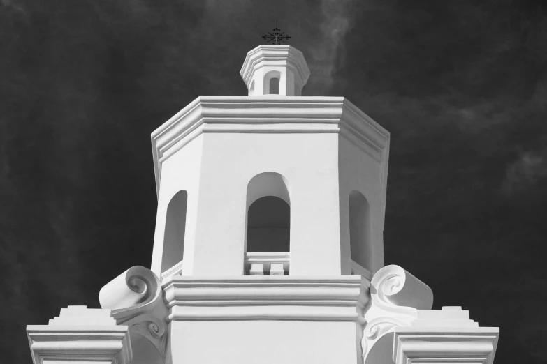 a building with an ornate clock and pillars